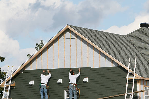 Professional Siding Contractor technician working in Grassflat, PA